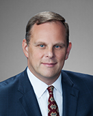 BRIAN SMOKER, Vice President, Finance & Corporate Controller